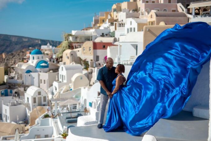 Santorini: Unique Flying Dress Photoshoot With Drone! - Drone Photographer
