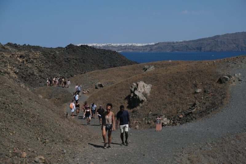 Santorini: Volcano and Hot Springs Sunset Dinner Cruise - Tour Duration and Guide