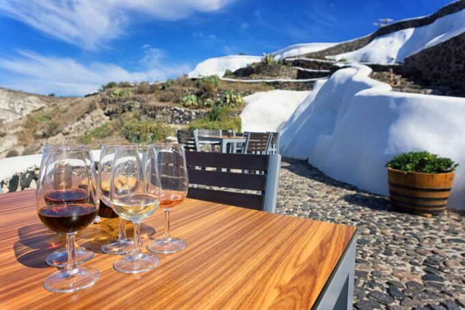 Santorini: Wine Tasting Tour to 3 Wineries With Transfer - Sampling Santorinis Unique Wine Varietals