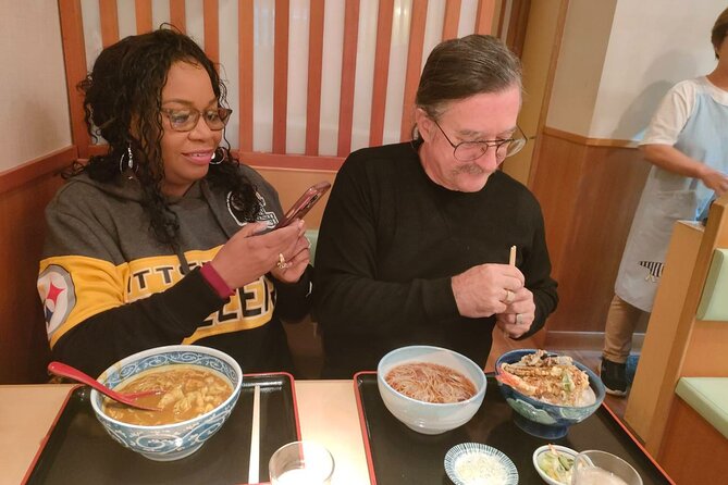 Savor Yanaka a Friendly Walking Food Tour With Guide - Duration and Group Size