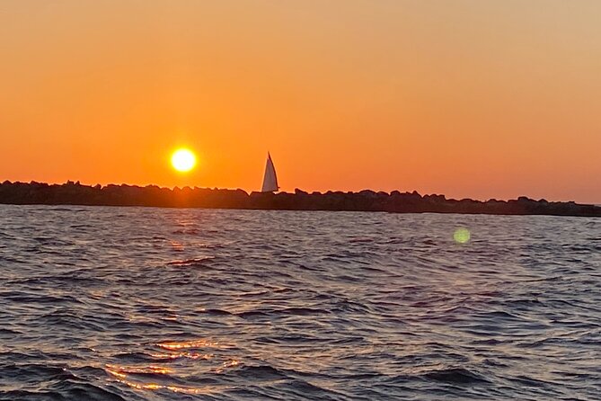 Scream Machine Sunset and Dolphin Beachfront Cruise - Booking Advice for Travelers