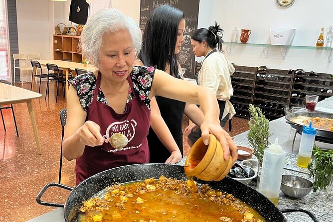 Seafood Paella Cooking Class, Tapas and Visit to Ruzafa Market. - Multi-lingual Guide