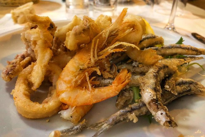 Seaside Naples Food Tour With Marina Promenade & Visit of Castel Dellovo - Exploring Vibrant Neighborhoods