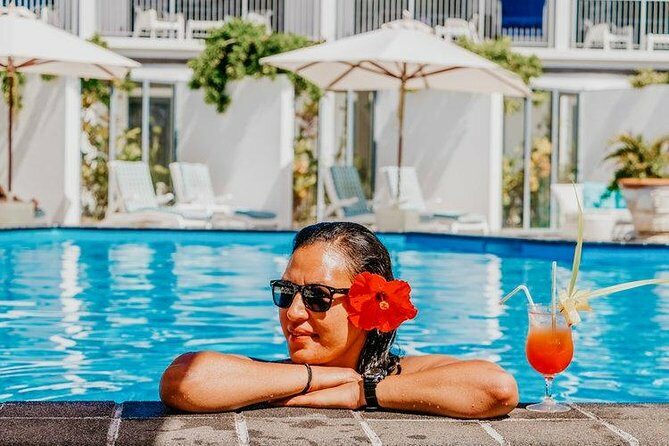 Seat in Coach Transfer from Rarotonga Hotel to Airport - The Sum Up