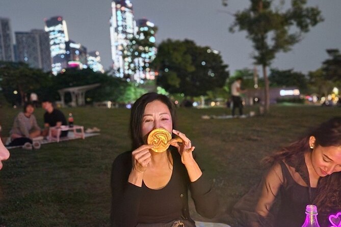 Seoul: Han River Guided Night Cruise and Hangang Park Picnic - Interactive Games and Picnic Setup