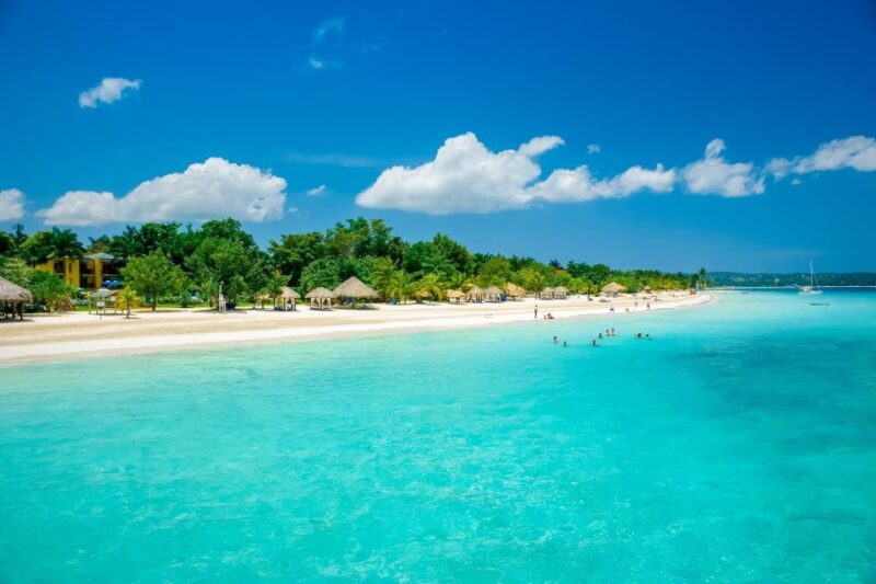 Seven Mile Beach, Parasailing and Beach Tubing Private Tour - Scenic Drive to Seven Mile Beach