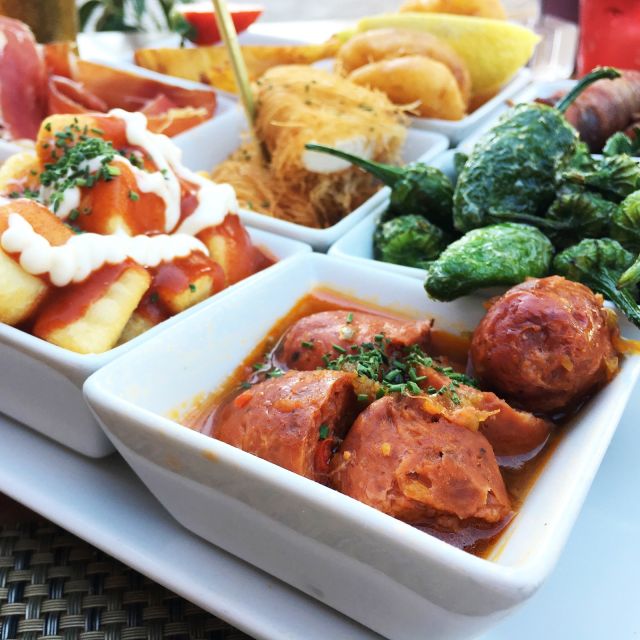 Seville: 3-Hour Guided Tapas Tour in Seville - Discover Triana District