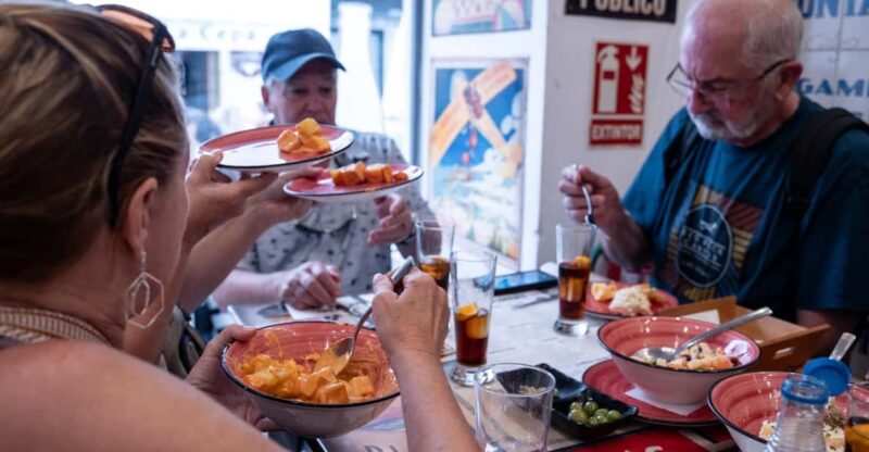 Seville Adventure: Historic Walking Tour & Traditional Tapas - Key Points