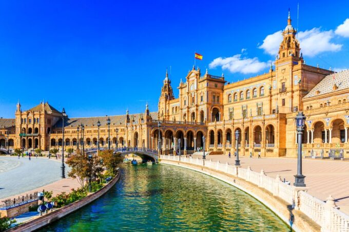 Seville: Authentic and Romantic Horse-Drawn Carriage Ride - Experiencing Sevilles Historic Triana Neighborhood