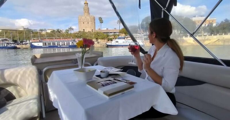 Seville: Exclusive River Boat Tour With Tapas - Key Points