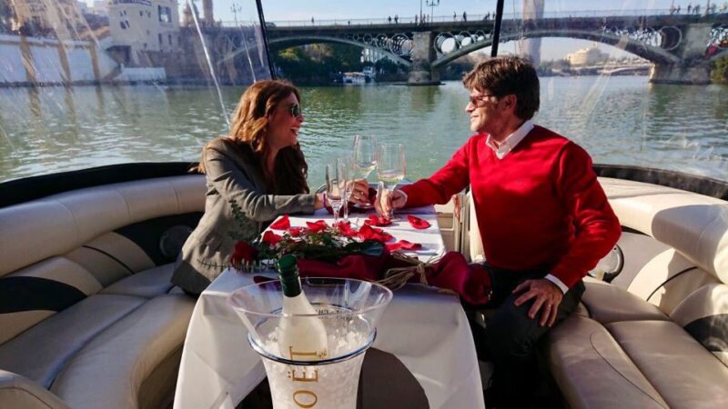 Seville: Exclusive River Boat Tour With Tapas - Onboard Experience