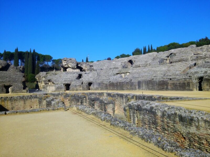 Seville: Italica Roman Ruins City Tour - Exploring the Amphitheater