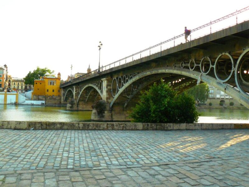 Seville: Legends of Triana Tour & Eco Cruise - Key Points