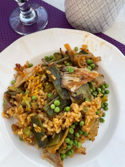 Seville: Paella Dining Experience With Incredible Views - Sherry Welcome and Local Appetizers
