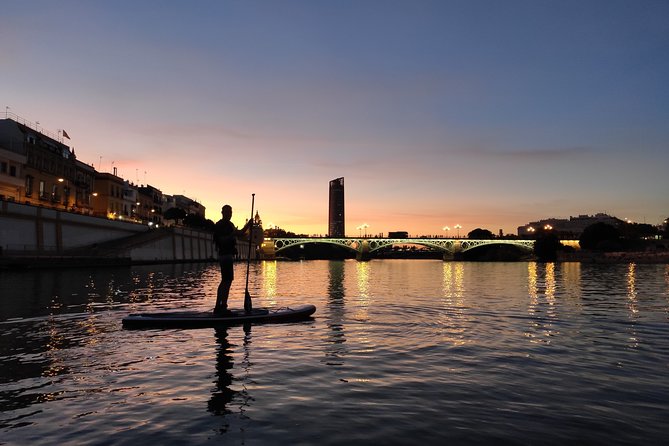 Seville: Sunset in Paddle Surf - Booking and Cancellation Details