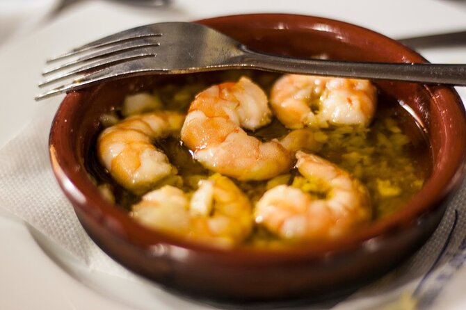 Seville Walking Food Tour With Secret Food Tours - Savoring Andalusian Flavors