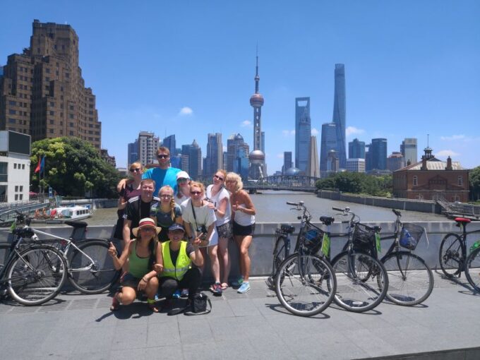 Shanghai: Full Day Classic Bike Tour With an Authentic Lunch - Riding Through Neighborhoods and Parks