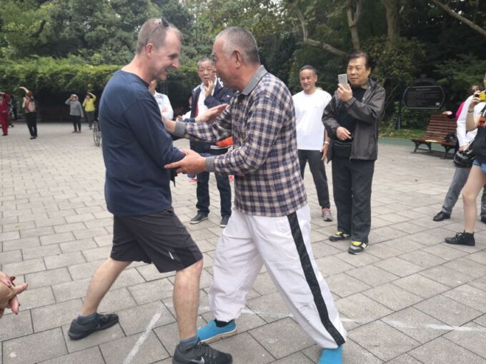 Shanghai: Herb Market, Taoist Temple and Tai Chi Bike Tour - Tai Chi Practice in the Park