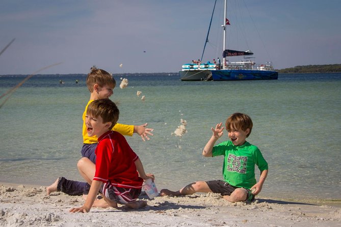 Shell Island Snorkel and Dolphin Catamaran Cruise With Island Time - Meeting and Pickup