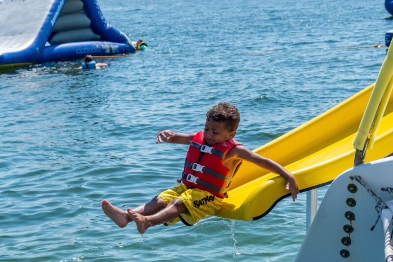 Shell Island: Water Park and Dolphin Watching Boat Trip - Key Points