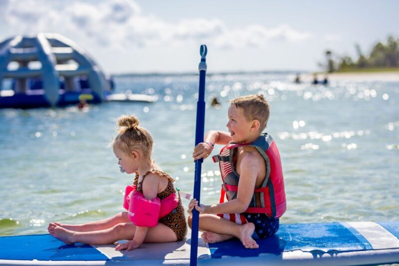 Shell Island: Water Park and Dolphin Watching Boat Trip - Experience Highlights
