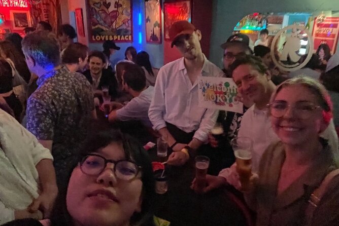 Shinsaibashi Meet Locals and Chat With Drink All You Can - Pricing and Booking Details