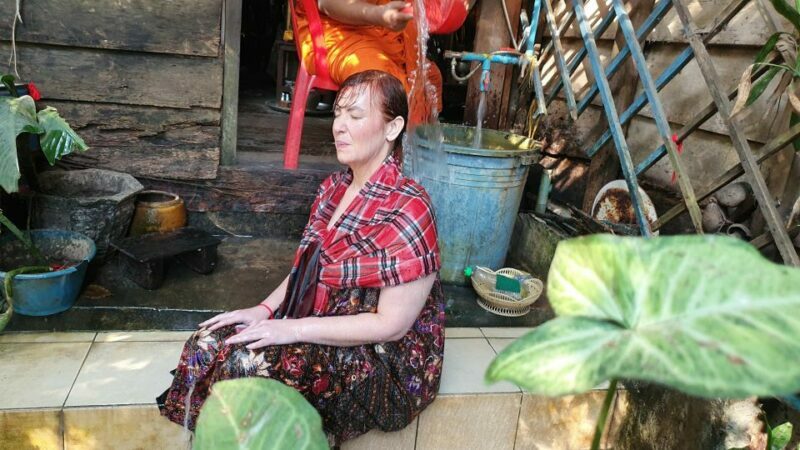 Siem Reap Cambodian Buddhist Water Blessing and Local Market - Who Will Benefit Most?