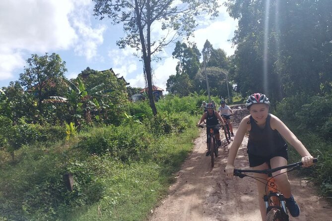 Silk Island Cycling Adventure & Lunch With Locals - Visiting an Authentic Buddhist Temple