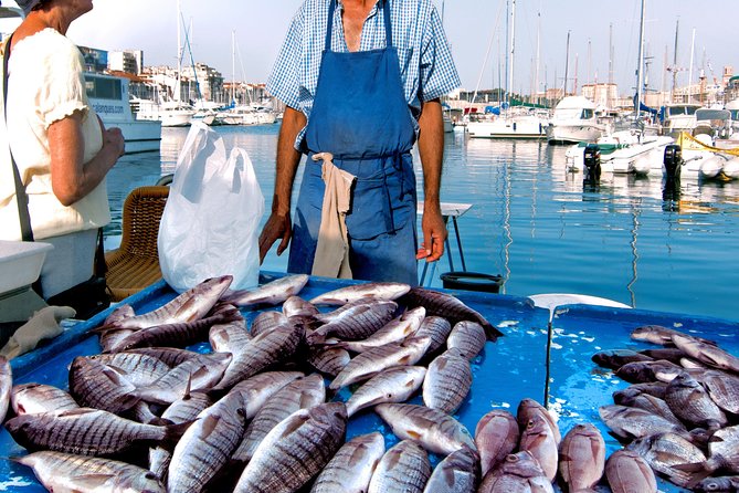 Small Group Market Tour & Dining at Cesarinas Home in Santa Teresa Di Gallura - Key Points