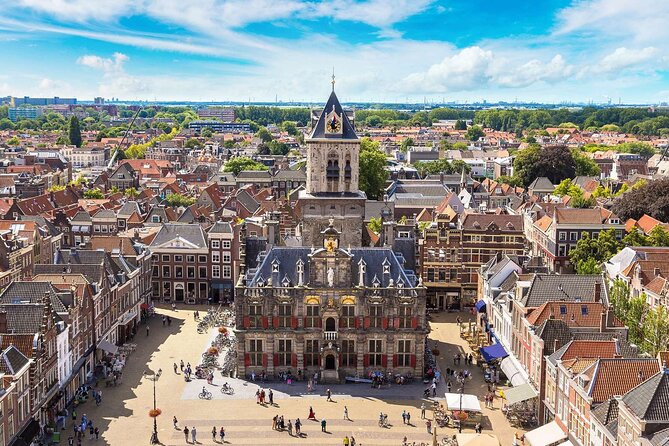 Small Group Tour to Kinderdijk Windmills and Delft From Amsterdam - Discovering Historic Delft