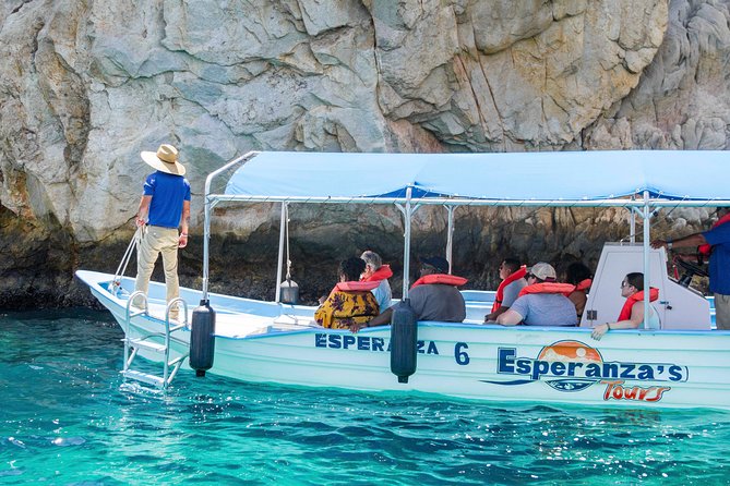 Snorkel Tour to Pelican Rock by Glass-Bottom Boat With Souvenir Photos - Souvenir Photos and Refreshments