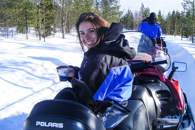 Snowmobile Safari in the Forest - Warming up With Refreshments