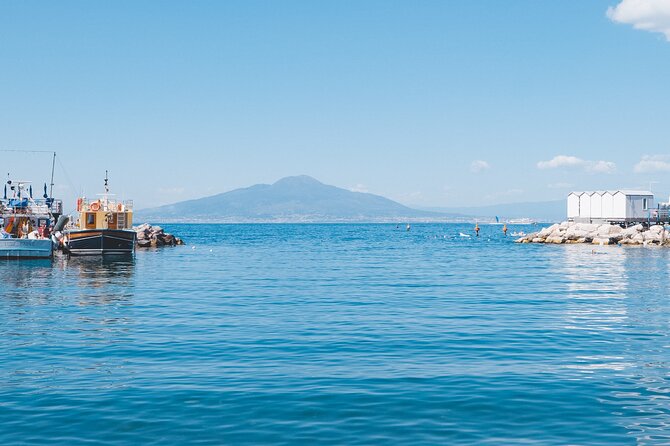 Sorrento Coast Cruise in Typical Gozzo With Limoncello Tasting - Coastal Sightseeing and Exploration