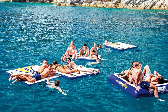 Special Tour for Groups Sailing Along the Costa Brava in a Big Catamaran. Food and Drinks Included. - Meeting and Pickup