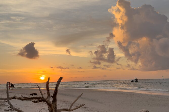 St. Pete Dolphin Watching and Island Sunset Cruise - Capturing the Sunset Views