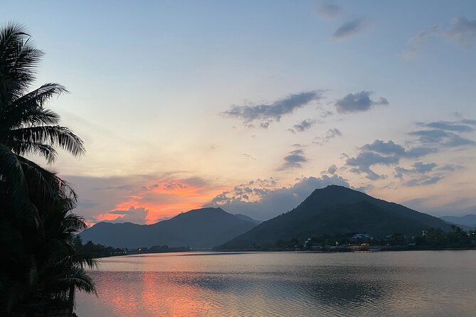 Stand Up Paddle Boarding and Sunset Watching on Cai River - Tranquil Sunset Viewing