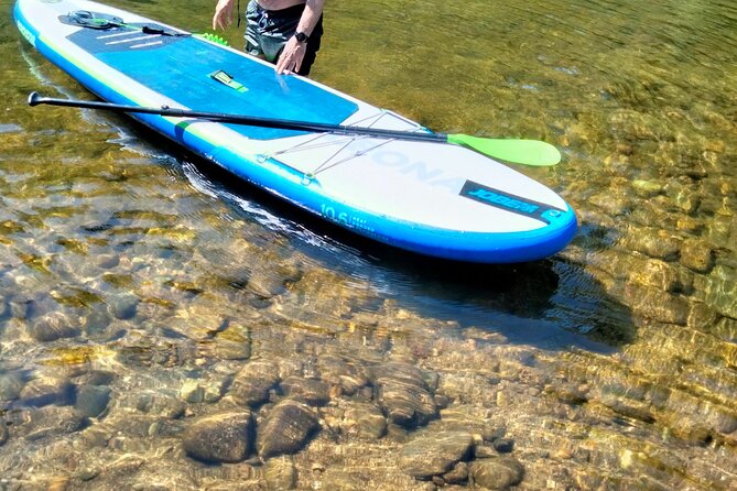 Stand up Paddle Surf Tour in Love Island With Pick up - Booking and Cancellation