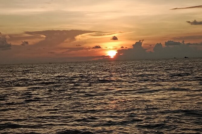 SUNSET Boat Trip-Seafood BBQ Dinner on Cruise-Night Squid Fishing - Pricing and Booking
