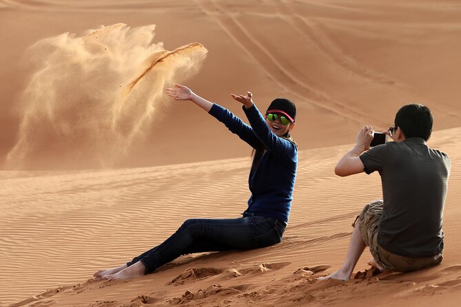 Sunset Camel Trek & Red Dunes Safari With BBQ at Al Khayma Camp From Dubai - Dining and Entertainment