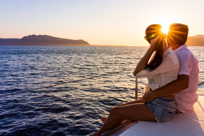 Sunset Catamaran Cruise Dia Island With Premium Menu - Key Points