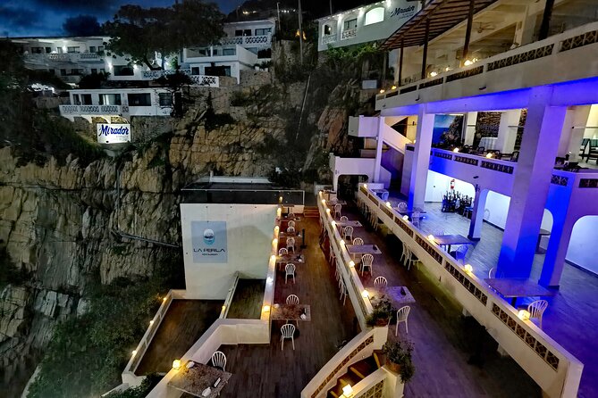 Sunset + High Cliff Divers La Quebrada at La Perla - Only Drinks - Rare Diver Photo Opportunities