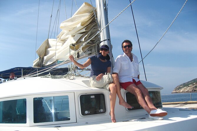 Sunset on a Catamaran: From Es Vedrá to Cala Conta - Schedule and Participation