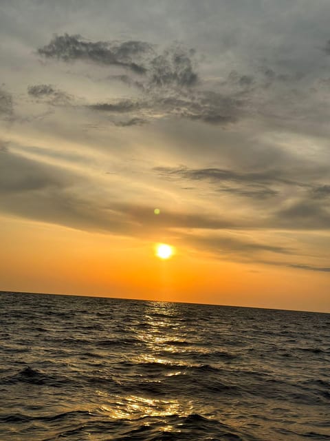 Sunset Panoramic Cruise With Drinks and Nighttime Dip - Refreshments and Amenities