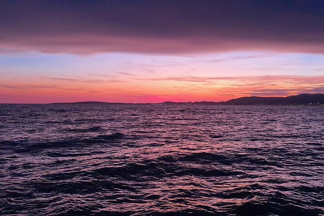 Sunset Sailing Catamaran With BBQ Along the Coasts of Mallorca - Unforgettable Sunset Sailing Adventure
