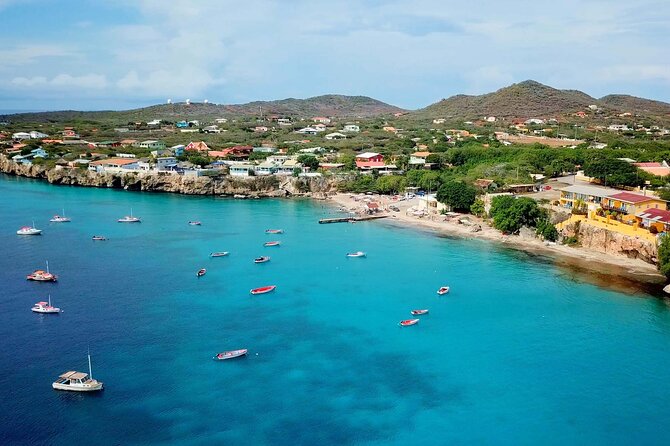 Swim With Turtles at Turtle Bay, Curacao: Boat, Blue Room Cave - Inclusions, Exclusions, and Pricing