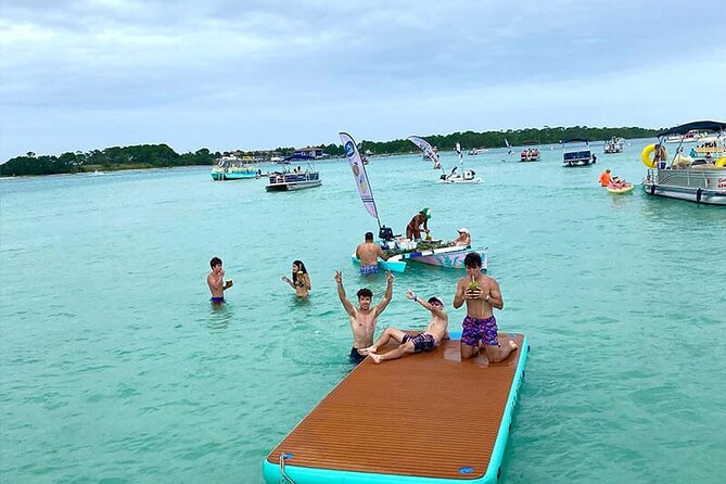 TAILFINS Tiki Boat/Sunset Cruise Crab Island 1.5HR PRIVATE - Navigating to the Meeting Point
