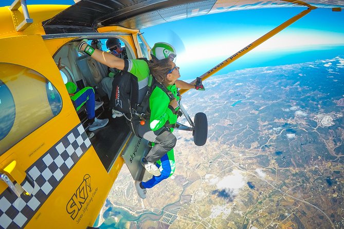 Tandem Skydiving 15,000ft - W/ Shuttle From Faro - Cancellation Policy