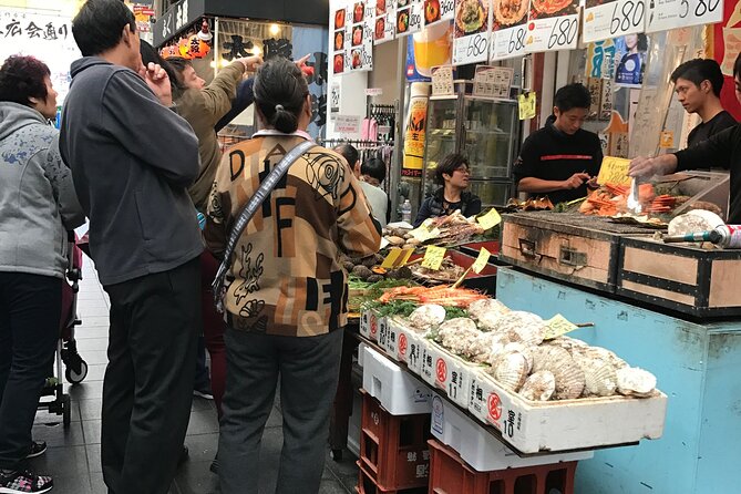 Taste Osaka Kitchen Through The Ultimate Kuromon Market Food Tour - Savory Treats at Kuromon Market