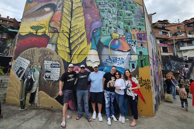 The Best Comuna 13 Graffiti Tour, Plaza Botero and Cable Cars - Riding the Innovative Electric Escalators