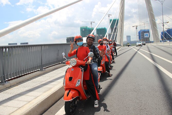 The Insiders Saigon With Female Ao Dai Riders Vespa 4,5 Hours - Tour Overview